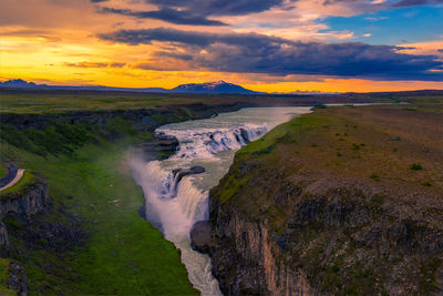 Scenic view of landscape against sky during sunset