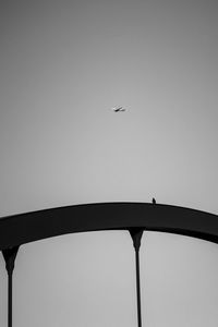 Low angle view of airplane flying in sky