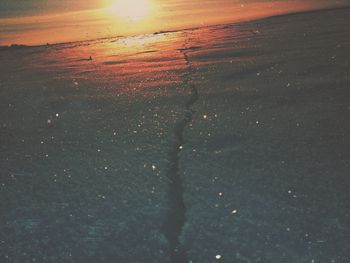 Scenic view of sea at sunset