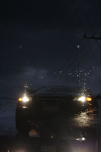 Illuminated road at night