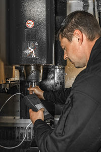 Side view of man working