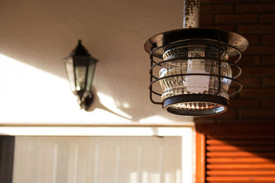 Low angle view of illuminated light bulb