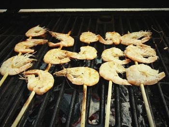 Close-up of meat on barbecue grill