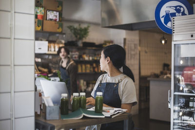 People standing in restaurant