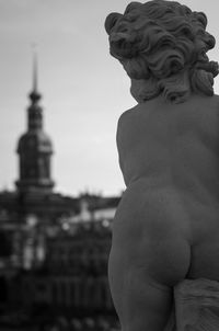 Statue of historic building against sky