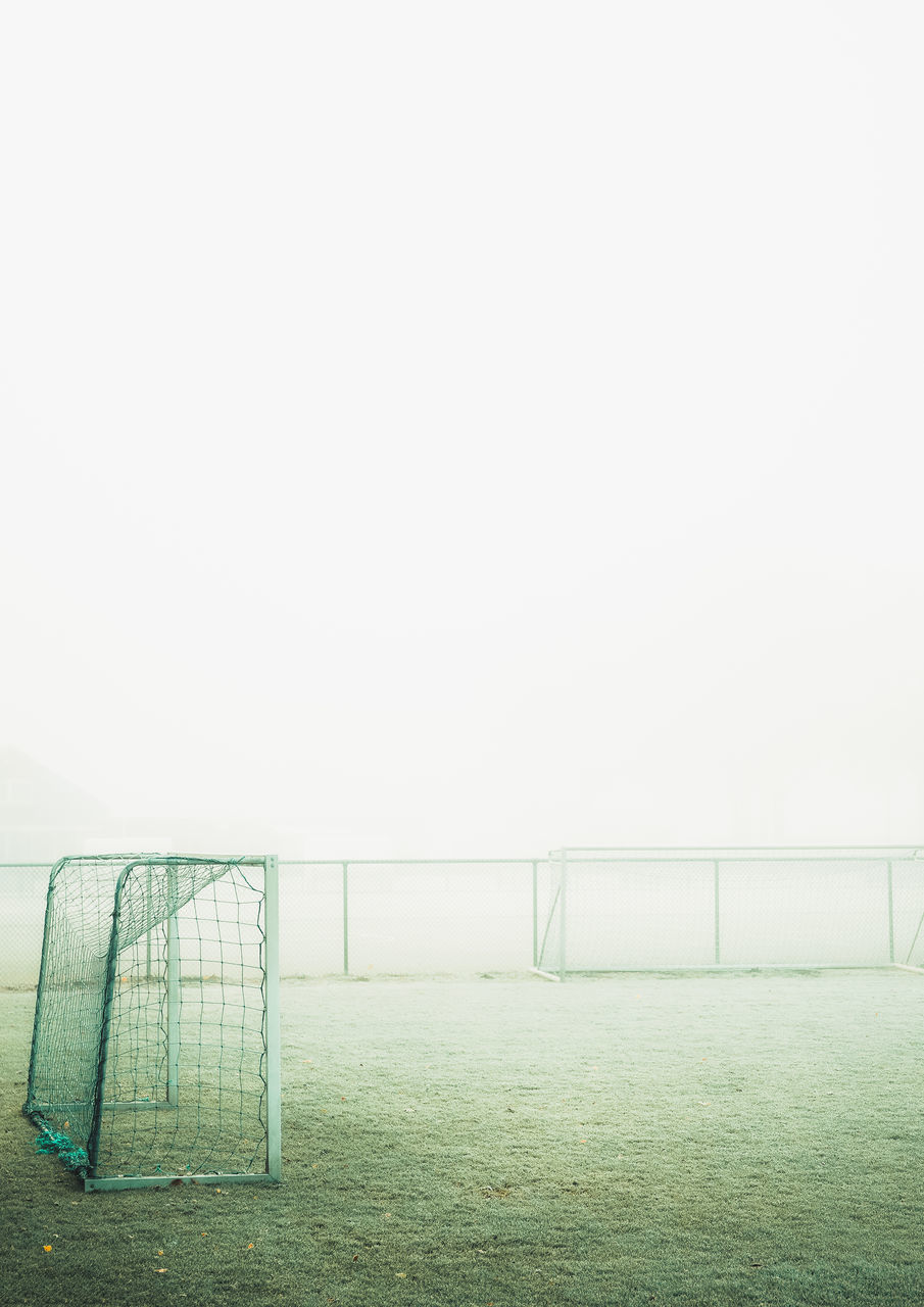 SCENIC VIEW OF SOCCER FIELD AGAINST SKY