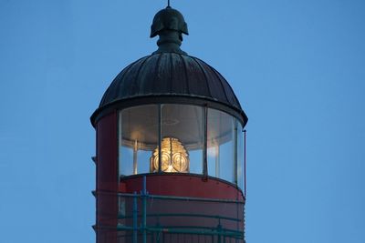 Low angle view of lighthouse against clear blue sky