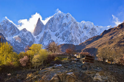 Scenic view of snowcapped mountains against sky