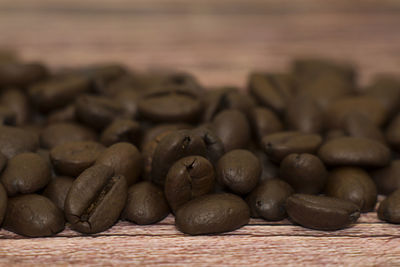 Close-up of coffee beans on table