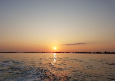 Scenic view of sea against sky during sunset