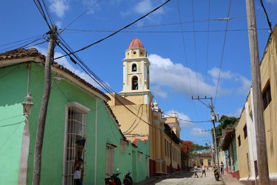 Low angle view of bell tower against sky