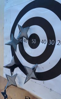 Low angle view of information sign on metal wall