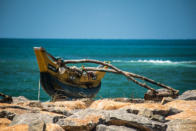 Scenic view of sea against blue sky