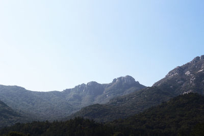 Scenic view of mountains against clear sky