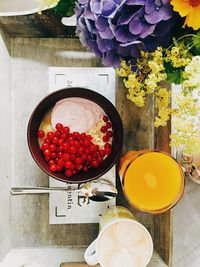 Close-up of red flowers in bowl