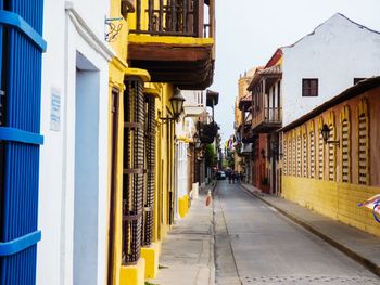 Narrow alley with buildings in background