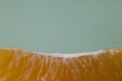 Close-up of fruit over white background