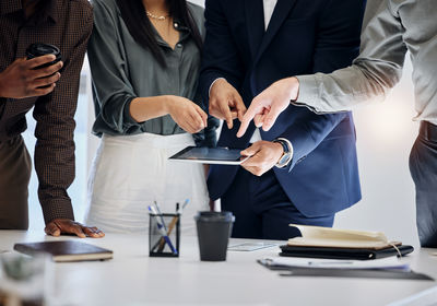 Business colleagues working at table