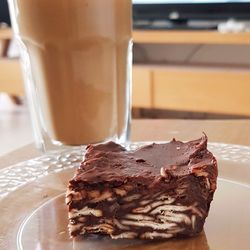 Close-up of chocolate brownie in plate on table