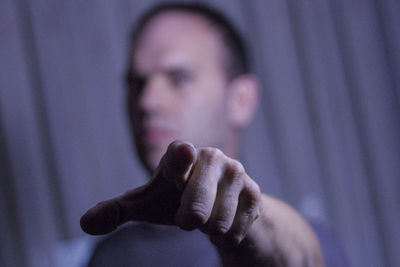 Close-up of man gesturing