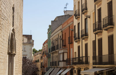 Exterior view of historical buildings in the old town streets of figueres, catalonia, spain, europe.