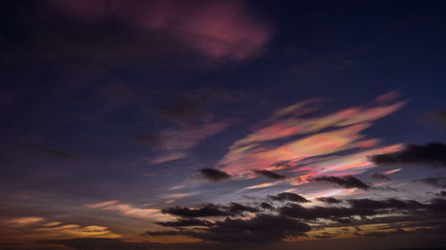 Low angle view of dramatic sky during sunset