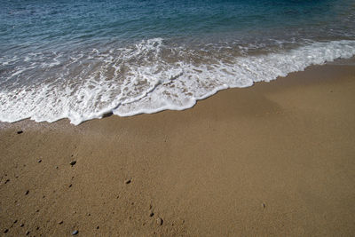 High angle view of surf on beach