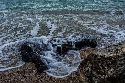 High angle view of rocks on beach