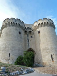 Low angle view of historic building against sky