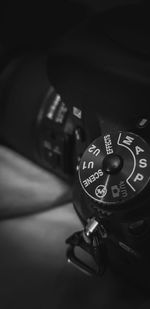 Close-up of clock on table