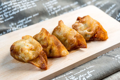 Close-up of samosas in tray