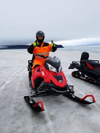Man on sea against sky