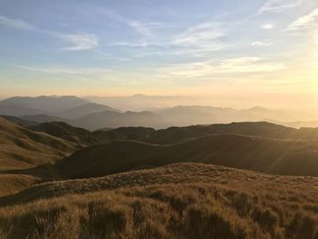 Scenic view of landscape against sky during sunset