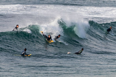 High angle view of people on sea