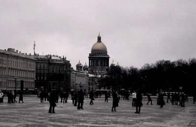 Tourists in front of building