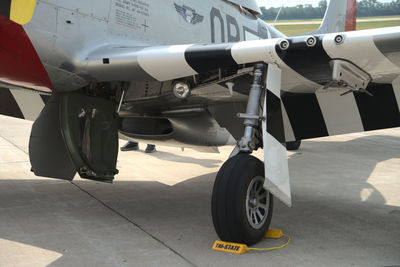 Close-up of airplane on airport runway