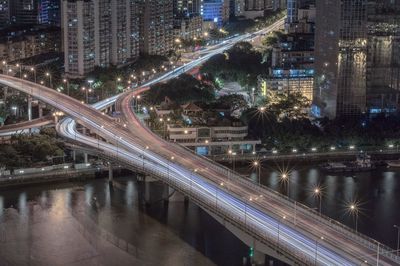 High angle view of light trails on road in city