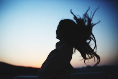 Close-up of silhouette tree against sky