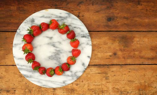 Directly above shot of fruits in bowl on table