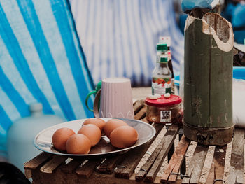 Close-up of eggs in container on table