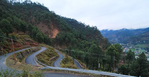 Scenic view of mountain road against sky