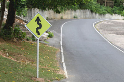 Arrow sign at roadside