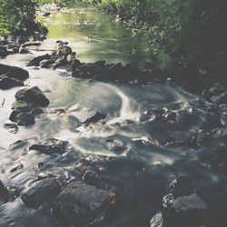 Stream flowing through rocks