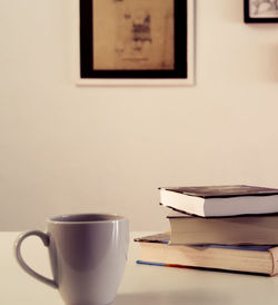 Close-up of coffee cup on table