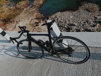 High angle view of bicycle parked on road