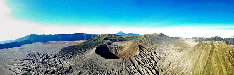 Panoramic view of landscape and mountains against sky