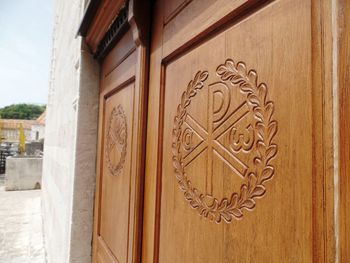 Close-up of wooden door of building