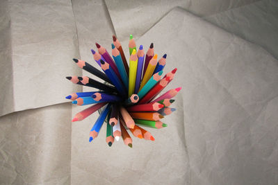 High angle view of multi colored pencils on table