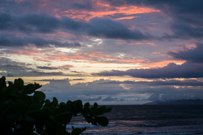 Scenic view of sea against sky at sunset