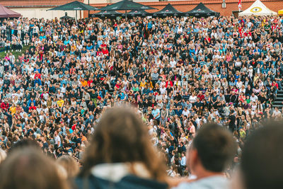 Group of people in front of crowd